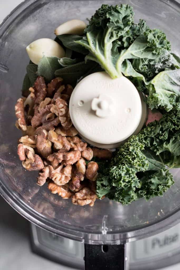 pesto ingredients in a food processor