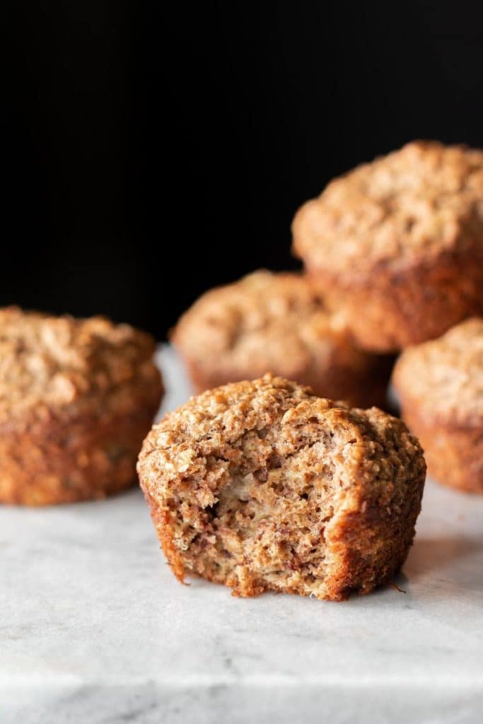 bran muffin with bite taken from it