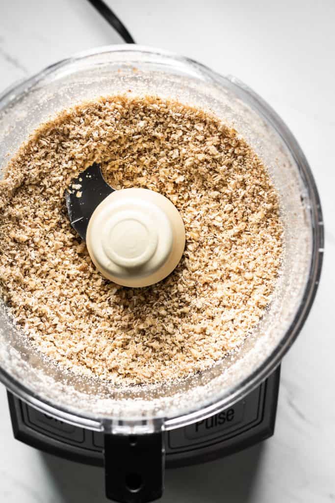 oats and walnuts crumbled in a food processor