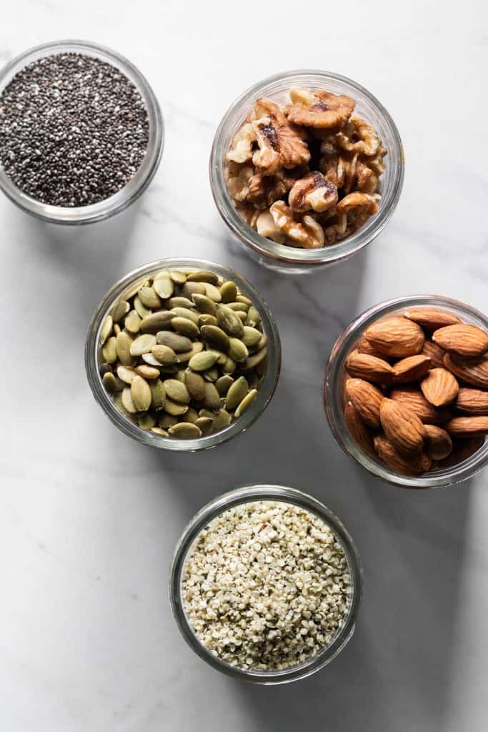 nuts and seeds in jars from the top