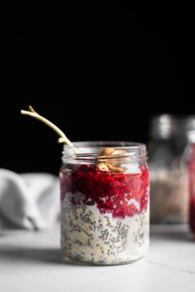 peanut butter & jelly overnight oats in a jar from the side
