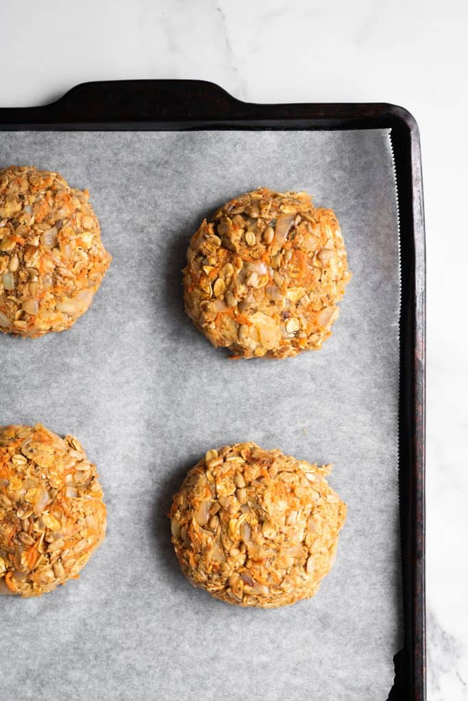 chickpea burger patties on a baking sheet