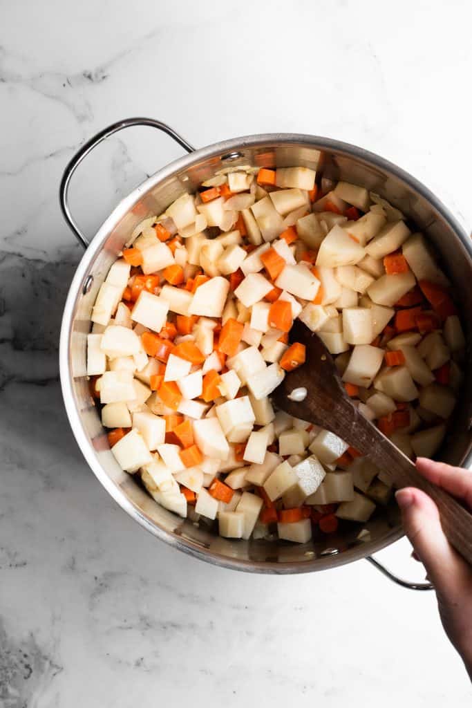 carrots and onions in a saucepan
