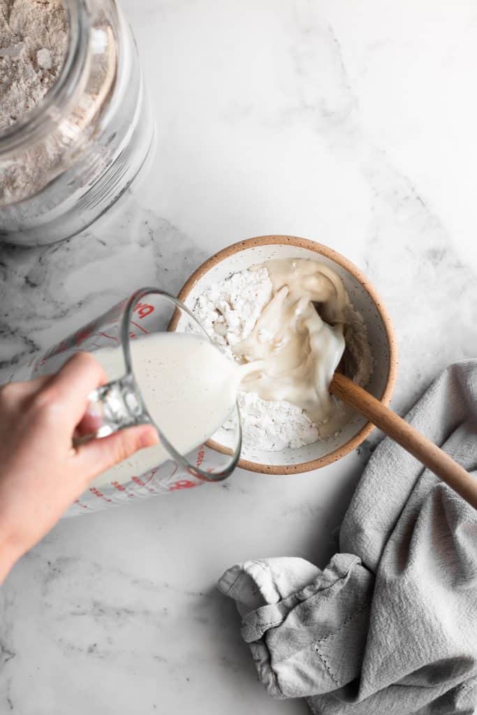milk poured over flour