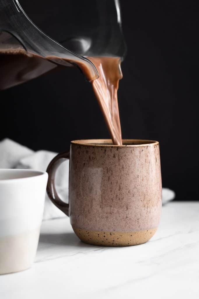salted maple hot cocoa poured in a cup