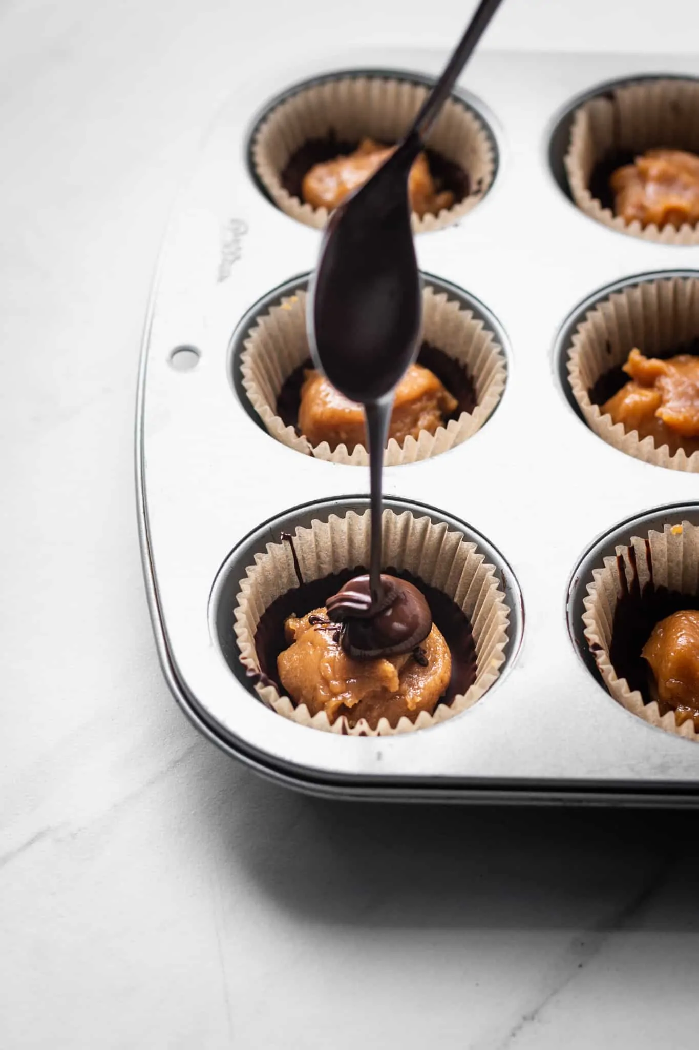 chocolate poured over caramel