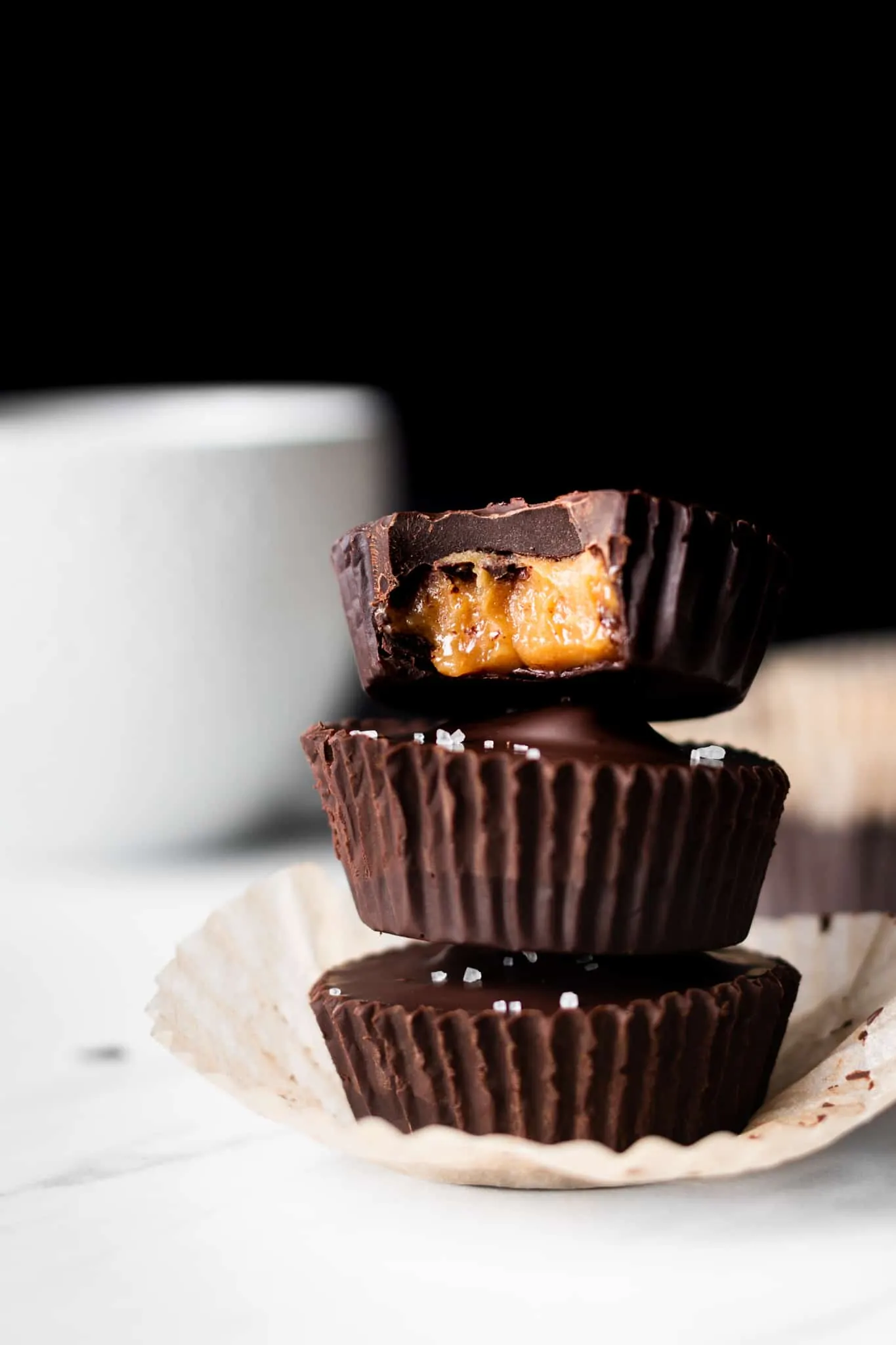 chocolate caramel peanut butter cups with bite taken