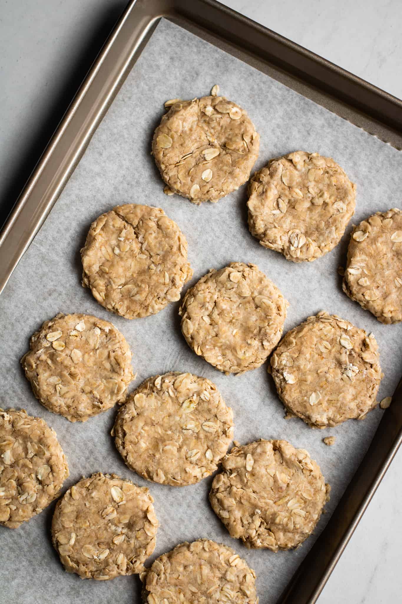 oatcakes unbaked on baking sheet