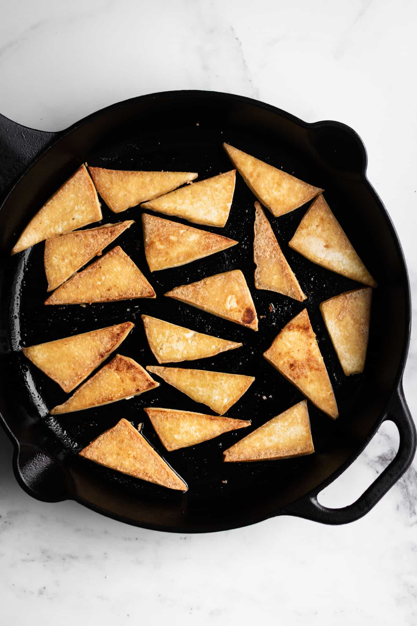 tofu in a cast-iron skillet